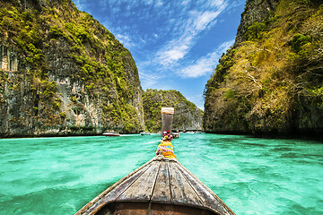 Image showing Traditional wooden boat in a picture perfect tropical bay on Koh Phi Phi Island, Thailand, Asia