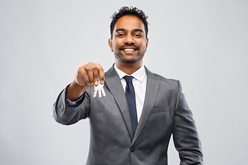 Image showing indian man realtor with keys and folder