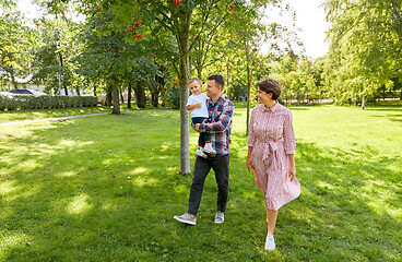 Image showing happy family at summer park