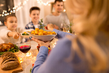 Image showing happy family having dinner party at home