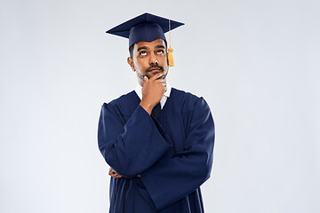 Image showing graduate student in mortar board thinking