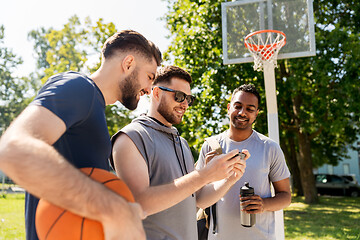 Image showing men with smartphone at basketball playground