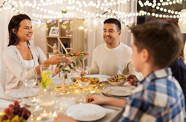 Image showing happy family having dinner party at home