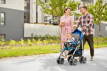 Image showing family with baby in stroller and coffee in city