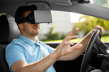 Image showing man or driver wearing vr glasses and driving car