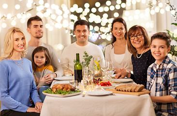 Image showing happy family having dinner party at home