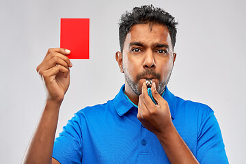 Image showing indian referee whistling and showing red card