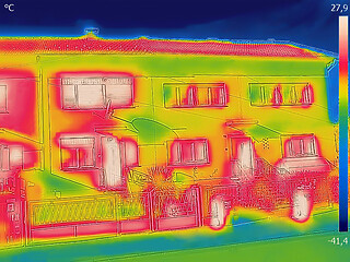 Image showing Thermal image of a family house where heat loss is seen