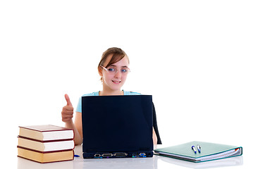 Image showing Teenager girl on desk