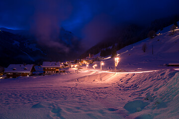 Image showing mountain village in alps  at night