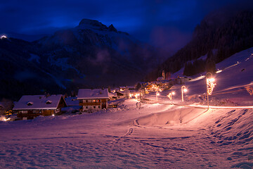 Image showing mountain village in alps  at night