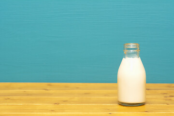 Image showing Fresh creamy milk in a one-third pint glass bottle