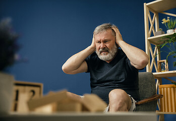 Image showing Old bearded man with alzheimer desease