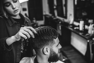 Image showing Client during beard shaving in barber shop