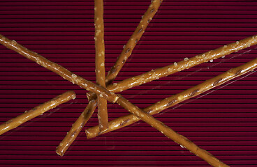 Image showing salt sticks on dark ground