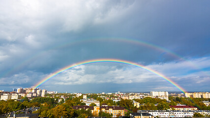 Image showing Double rainbow in the sky over the roofs of the resort city of Anapa, Russia