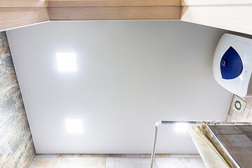 Image showing Stretch matte ceiling in the bathroom with three square lamps