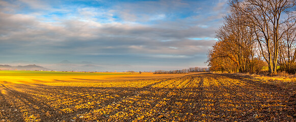 Image showing Autumn plowed field at amazing sunrise. Czech Republic