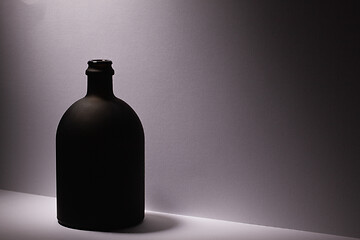 Image showing Luxury Black Glass of Rum on the white background