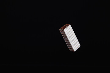 Image showing One levitating chocolate wafer 