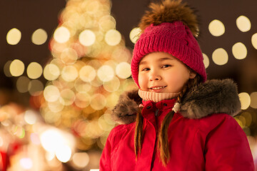 Image showing happy little girl at christmas market in winter