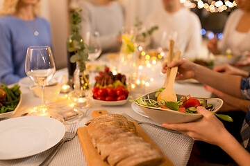 Image showing happy family having dinner party at home