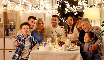 Image showing family having birthday party and taking selfie