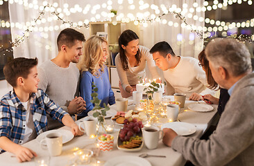 Image showing happy family having birthday party at home