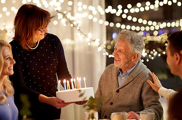 Image showing happy family having birthday party at home