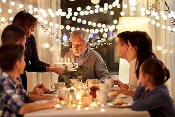 Image showing happy family having birthday party at home