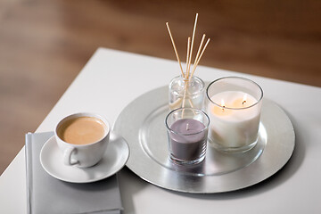 Image showing coffee, candles and aroma reed diffuser on table