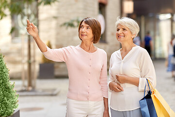 Image showing senior women with shopping bags in tallinn city