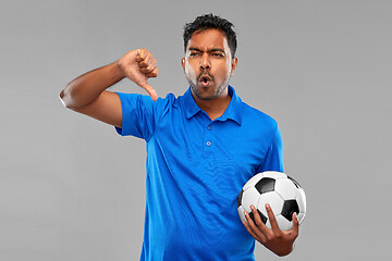 Image showing football fan with soccer ball showing thumbs down