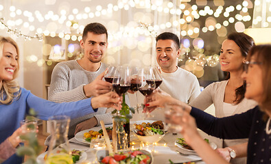 Image showing happy family having dinner party at home