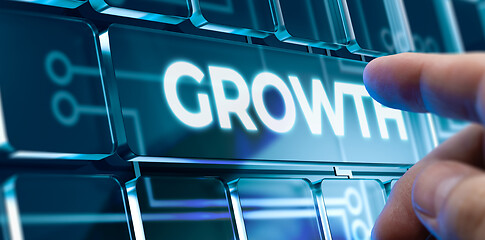 Image showing Growth - Man Pushing Button on Futuristic Interface.