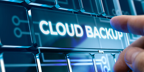 Image showing Cloud Backup - Man Pushing Button on Futuristic Interface.