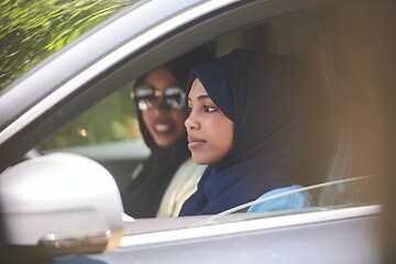 Image showing Arabic Woman Couple Traveling By Car