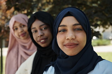 Image showing businesswoman group portrait wearing traditional islamic clothes