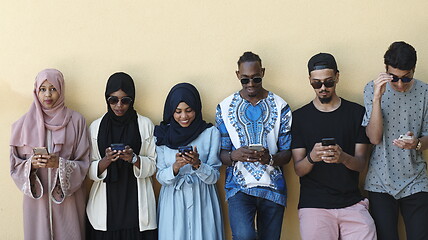 Image showing multiethnic startup business people group using smart phones