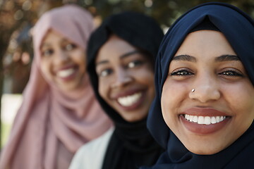 Image showing businesswoman group portrait wearing traditional islamic clothes