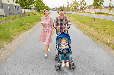 Image showing family with baby in stroller and coffee in city