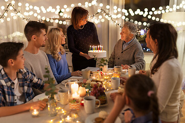 Image showing happy family having birthday party at home