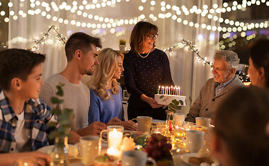 Image showing happy family having birthday party at home