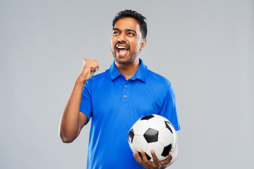 Image showing football fan with soccer ball celebrating victory