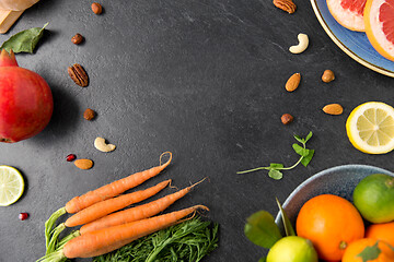 Image showing different vegetables and fruits on on slate table