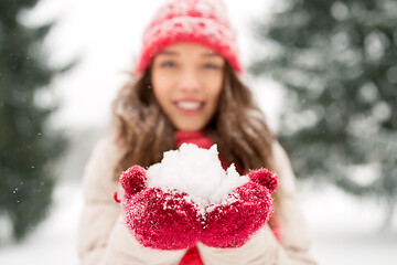 Image showing portrait of young woman with snow in winter