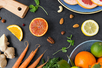 Image showing different vegetables and fruits on on slate table