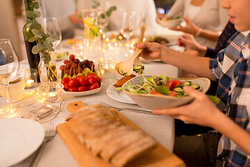 Image showing happy family having dinner party at home