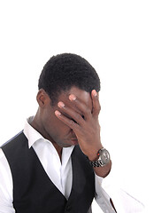 Image showing Black man covering his face