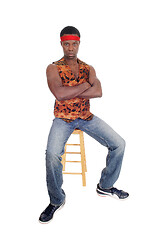 Image showing Handsome African man sitting in a vest